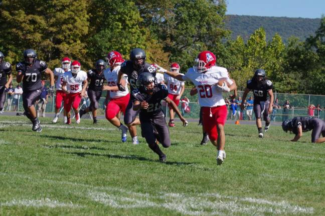 Wallkill Valley defenders pursue a Lenape Valley ball carrier.