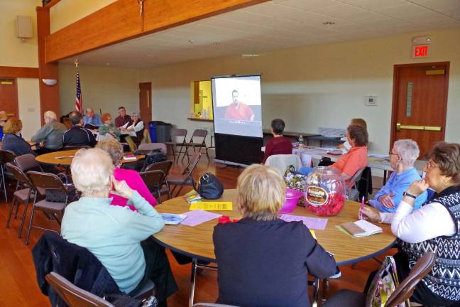 Sheriff reaches out to inform and protect PHoto by Chris Wyman Seniors watch a video of a convicted burglar explaining what he used to look for before he broke into a house.