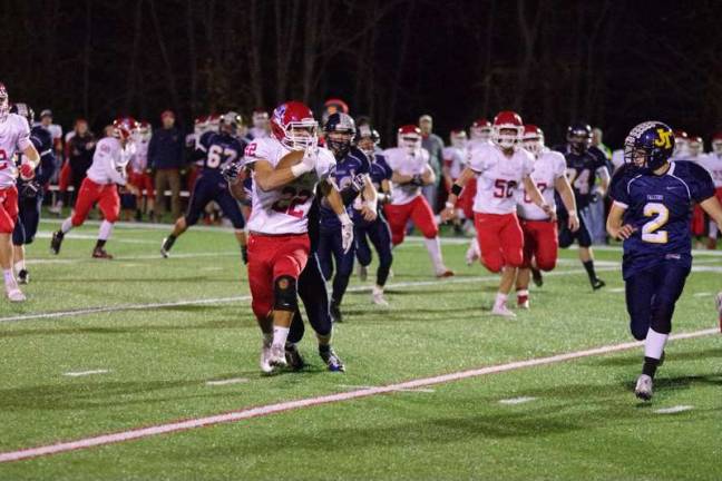 Lenape Valley ball carrier Troy Dupont runs with Jefferson defenders in pursuit.
