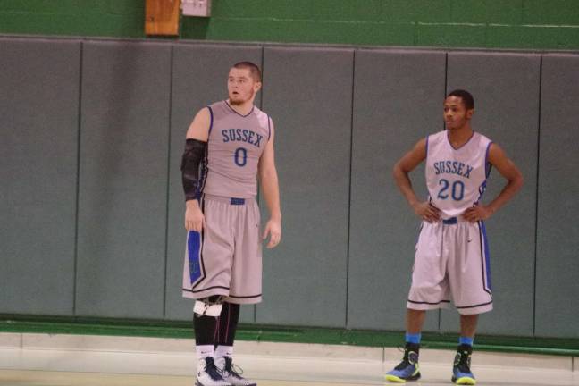 SCCC falls in basketball showdown Sussex County Skylanders Patrick McNamara and Kahlil Stewart during a break on the court.