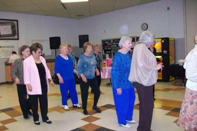 Senior citizens enjoyed dinner and dancing at the FBLA Senior Citizens&#x2019; Prom.