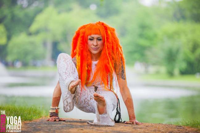 Tattooed yogi poses for the camera Photo by Joe Longo Hallie Hawkins wears a wig and Henna tattoos durign her photo shoot in Montclair.