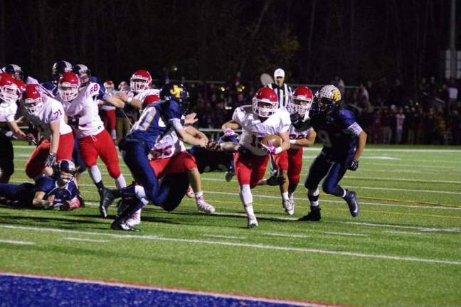 Lenape Valley ball carrier Stephen Leyden is grabbed by a Jefferson defender late in the fourth quarter. Leyden returned a punt 63 yards for a touchdown and kicked field goals of 20 and 31 yards.