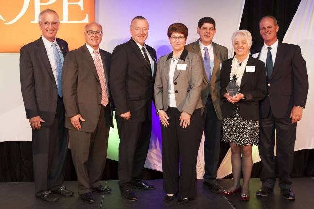 ShopRite supermarkets honored for enduring spirit From left, Joe Sheridan, executive vice president at Wakefern Food Corp., congratulates the RoNetco Supermarkets team of Dominick J. Romano, Dan Dobrzynski, Cathie Miller, John Reinhart, Christine Foster and Bill Candler for their accomplishments.