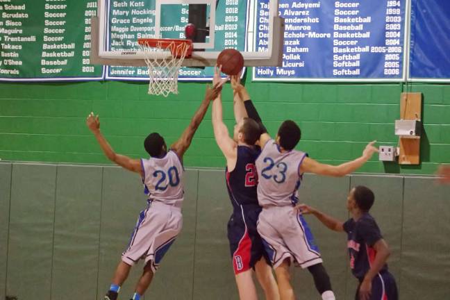 SCCC falls in basketball showdown The ball is up for grabs between the Sussex County Skylanders and Brookdale Jersey Blues.