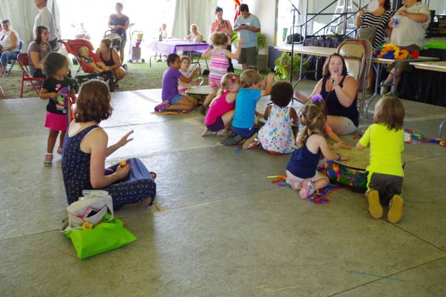 A drum circle was fun for many of the visiting children.