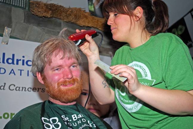 Franklin's Irish Cottage raises money to fight cancer Kevin Adams of Sparta didnít believe that his radical buzz cut would hurt. Maureen Pezzotta of Pro Haircutters of Rockaway supplied the tools and labor.