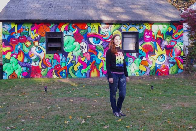 Last Wednesday, Steph Burr of Torrington, Conn. completed a mural for Mountain Murals and Music at 40 Limekiln Road in Hamburg. The painting took her 13 hours from start to finish.