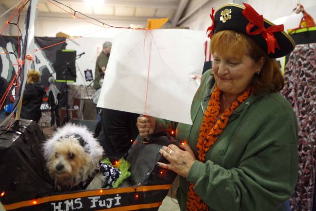 Author Deborah Guarino of Wantage and her dog Fuji were prize winners in the most original costume category. Locally, she is known for her children&#xfe;&#xc4;&#xf4;s book, &quot;Is Your Mama a Llama.&quot;