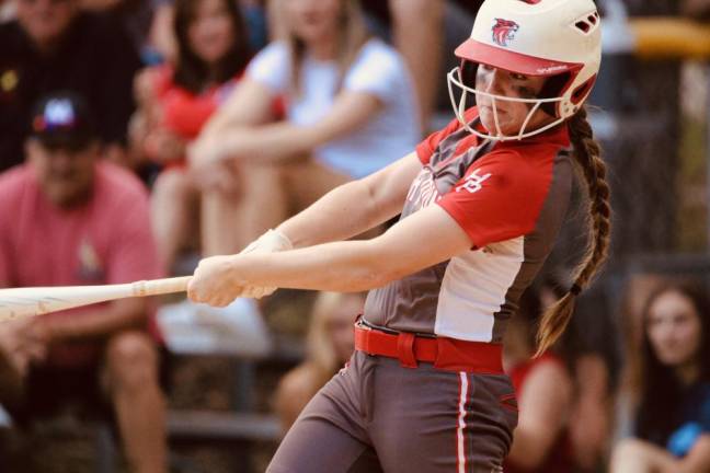 Junior Mikayla Conklin swings the bat.