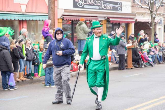 A leprechaun on Spring Street in last year's St. Patrick's Day Parade Photos by Laurie Gordon