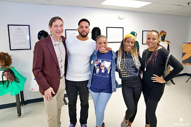 From left are Mark Valli, Norwescap chief executive; Scott Paul; Guada Jacob; Brittany Barthelemy; and Rose Magny.