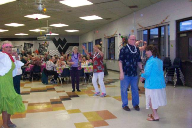 Local senior citizens enjoyed dancing at the prom.