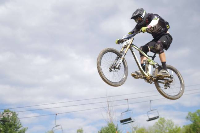 Mountain Creek hosts mountain biking event Jason Memmclair of Chester, N.Y., gets airborne during the 2014 Mountain Creek Spring Classic Mountain Bike Races.