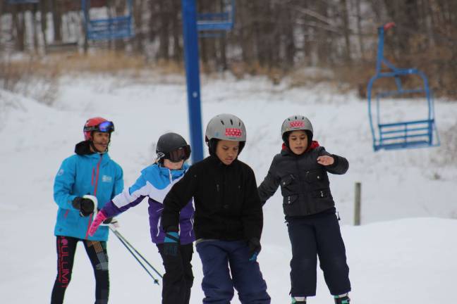 Hidden Valley changes hands Children from New York City YMCA branches hit the slopes at the beginner trail of the former Hidden Valley Ski Area in Vernon this past weekend. The mountain is being renamed the National Winter Activity Center. Photo provided.