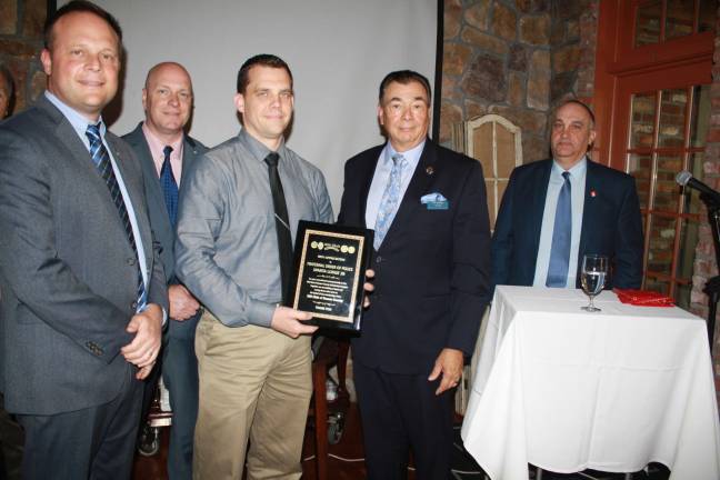 From left, Sparta Police Chief Neil Spidaletto, Sparta Det. Lt. Terrence Mulligan, FOP president Thomas Snyder of the Sparta PD, with Pat Aramini and Tony Torre of The 200 Club. Photos by Rose Sgarlato