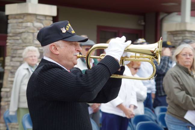 Taps was played by Air Force veteran Bob Caggiano of American Legion Post 132.