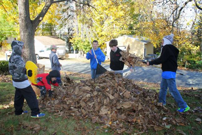 Cub Scouts rake Franklin Samaritan Inn Cub Scouts rake Franklin Samaritan Inn