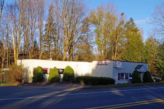 Where in responses People who identified themselves as Joann Huff, David Phillips, Pam Perler, Melissa McCoy, Rob Giarrusso, Maureen McCafferty and Rita LaBarck knew last week's photo was A's Country Spirits, located on Route 15 West/North and west of Route 94.