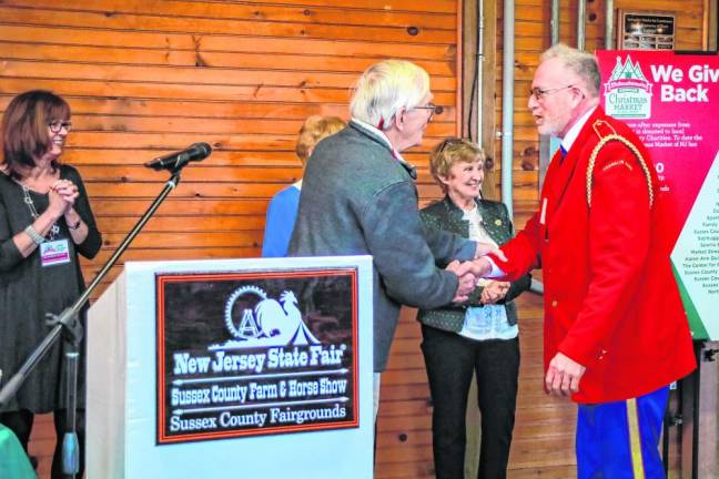 Jim Bradley, president of the Franklin Band, thanks Dan Sarnowski for the grant. (Photo by Brielle Kehl)