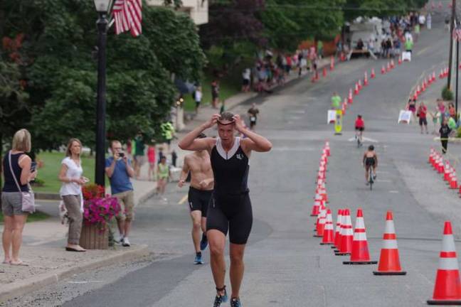 Swim, cycle, run Shannon Jenkins of Hamburg, NJ was the first female to finish the triathlon with an overall time of 1:15:42.03.