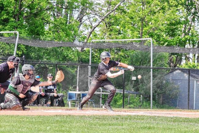 Photos: Rangers advance to semifinal Wallkill Valley batter Chris Collins is in a bunt position as the ball approaches. He made one run.
