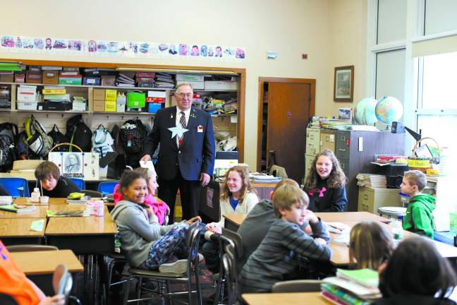 Photo by Gale Miko Commander Herman Terpstra talks to a class at Wantage Elementary School in March.