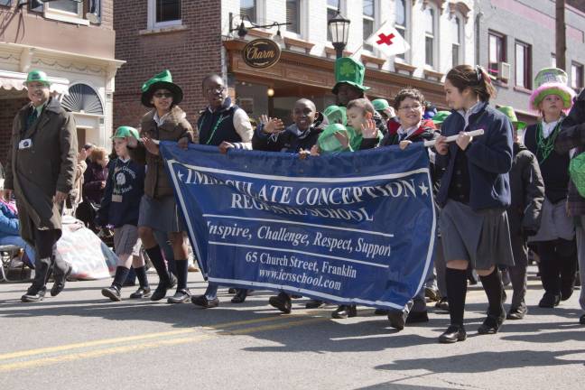 Newton goes green Marchers from Immaculate Conception Regional School in Franklin.