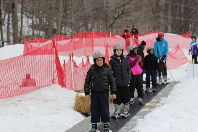 Children from New York City YMCA branches hit the slopes at the beginner trail of the former Hidden Valley Ski Area in Vernon this past weekend. The mountain is being renamed the National Winter Activity Center. Photo provided.