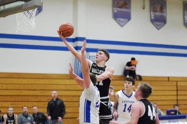 Wallkill Valley's Reyes Madera takes the ball towards the hoop in the second half. Madera scored 8 points.