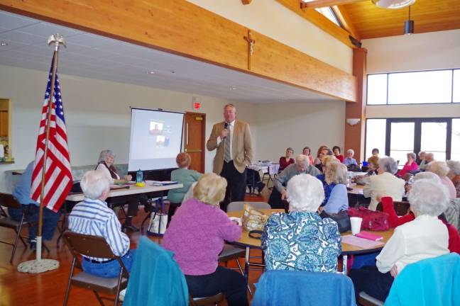 Sheriff reaches out to inform and protect PHoto by Chris Wyman Sheriff's Department Internal Affairs Director/retired Sparta Police Department Detective Sergeant John Schanstra introduces the presentationís segment on preventing burglaries.
