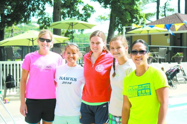 Pictured left to right are Sarah Cayan, Carol Fishbone, Elizabeth Smith, Bridget Hilgendorff, of Lake Mohawk Pool and Eleanor Young, of Pass It Along.
