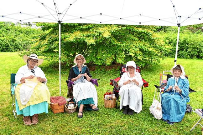 Township celebrates bicentennial Residents dressed in old-fashioned clothes demonstrate sewing. (Photo by Maria Kovic)