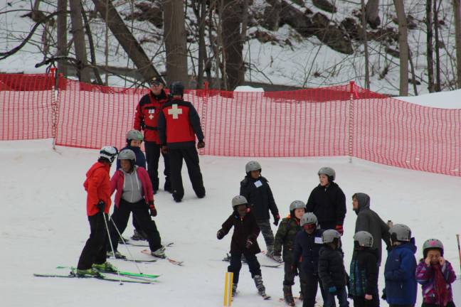 Children from New York City YMCA branches learn how to ski at the beginner trail of the former Hidden Valley Ski Area in Vernon this past weekend. The mountain is being renamed the National Winter Activity Center. Photo provided.