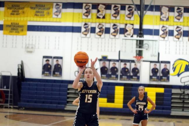 Jefferson's Kiley Shatzel holds the ball at the foul line. She scored five points.