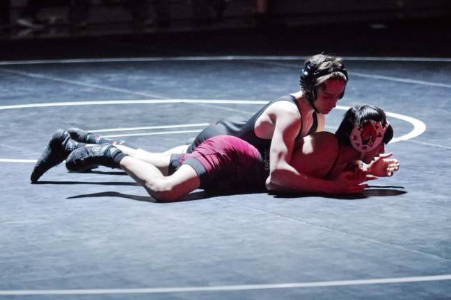 Pompton Lakes defeats Wallkill Valley Wallkill Valley's Nicholas Delcalzo is on top of Pompton Lakes' Aaron Herrera in the 106-pound weight class. He pinned Herrera in 2:13 to earn the win.
