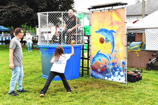 Borough’s day in the sun A child tries to dunk a police officer at Ogdensburg Day on Saturday, June 14. (Photos by Maria Kovic)