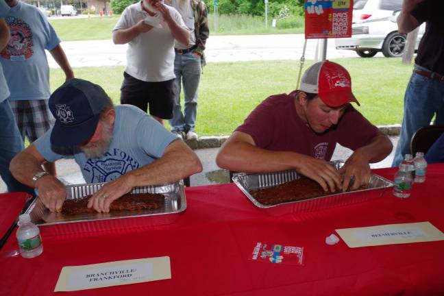 At left is Stan Utter of the Branchville/Frankford Fire Department and three-time winner Hunter Space of the Beemerville Fire Department. Space won the contest for each of the past three consecutive years.