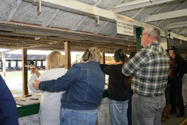 Franklin Revolver and Rifle Association hosts training Coaches Cliff and Charlin Ryerson correct shooter's stance and reinforce correct shooting fundamentals.