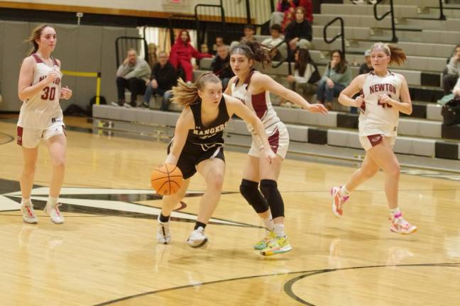 Wallkill Valley's Jackie Schels dribbles the ball in the game against Newton on Friday, Jan. 5. She scored 27 points and the Rangers won, 50-42. (Photos by George Leroy Hunter)