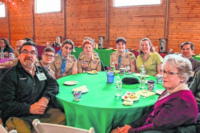 Boy Scouts have helped set up the German Christmas Market. (Photo by Brielle Kehl)