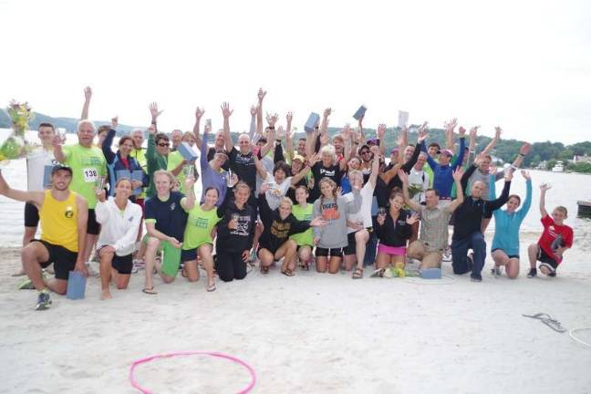 Swim, cycle, run Top finishers in a post race portrait.