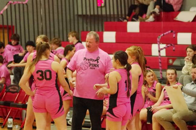 Wallkill Valley girls basketball head coach Earl Hornyak talks to players during a break. He has lost several family members to cancer.