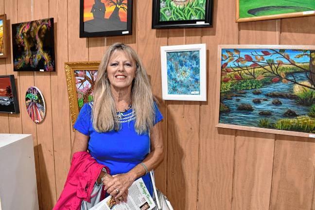 Photos: Meet the Artists Reception at State Fair <b>Artist Lorie Krieger with her acrylic painting ‘Quiet Beauty.’</b>