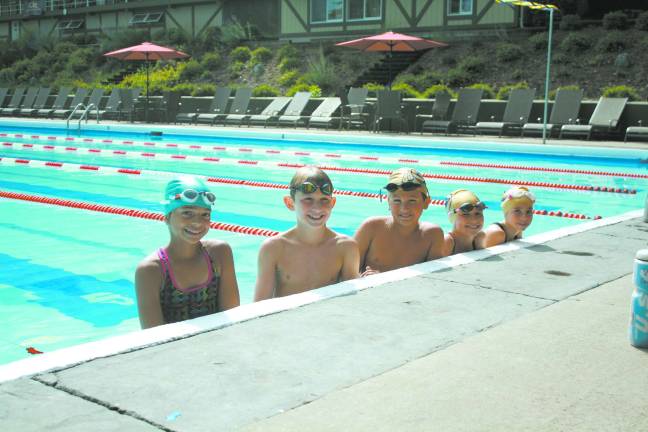 Swimmers pictured left to right are Yasmeen Caswell, Will Englehardt, Michael O'Krepky, Molly Englehardt and Ella Duphiney.