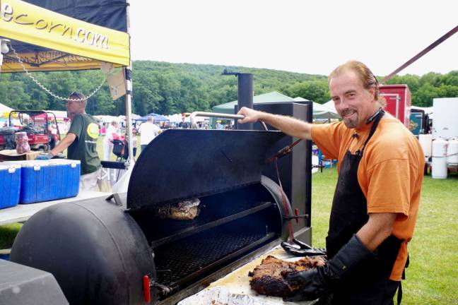 Scott Reid, owner of Jefferson-based Texas Smoke BBQ, offered his award-winning ribs to those attending Jefferson Day.