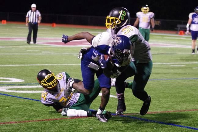 Edwards battles for extra yards after catching the ball in the second quarter.