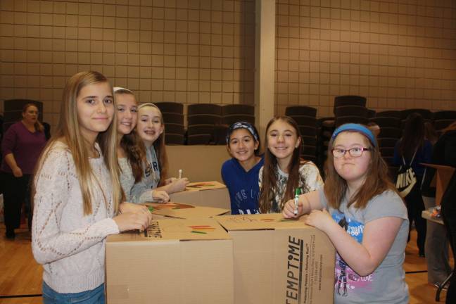 Seventh graders from Sparta Middle School, left side, Rachel Sasik, Jessica Firzlaff and Stephanie Villar; Right side, Kelsi Loewen, Natalie Kruyds and Katie Carrigan.