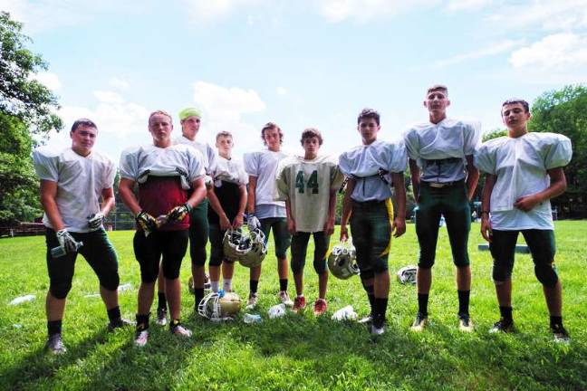 Several members of the 2016 Sussex County Tech Mustangs pose for a portrait on Monday August 15 at Harmony Ridge Campgrounds in Branchville.