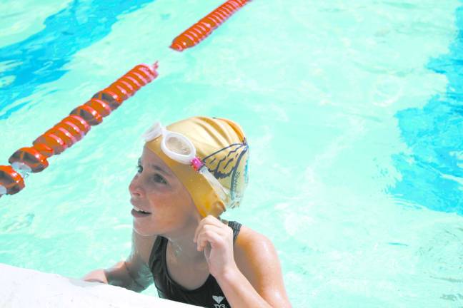 Seven-year-old simmer Ella Duphiney swam 32 laps.